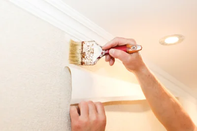 Pose de papier peint au Triadou — revêtements muraux et toiles de verre